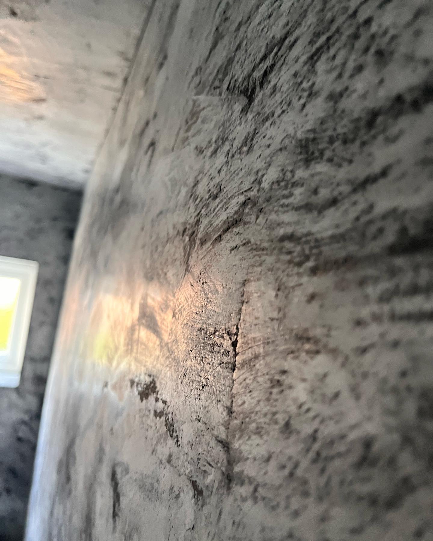 Close-up of the polished surface of a two-tone tadelakt wall