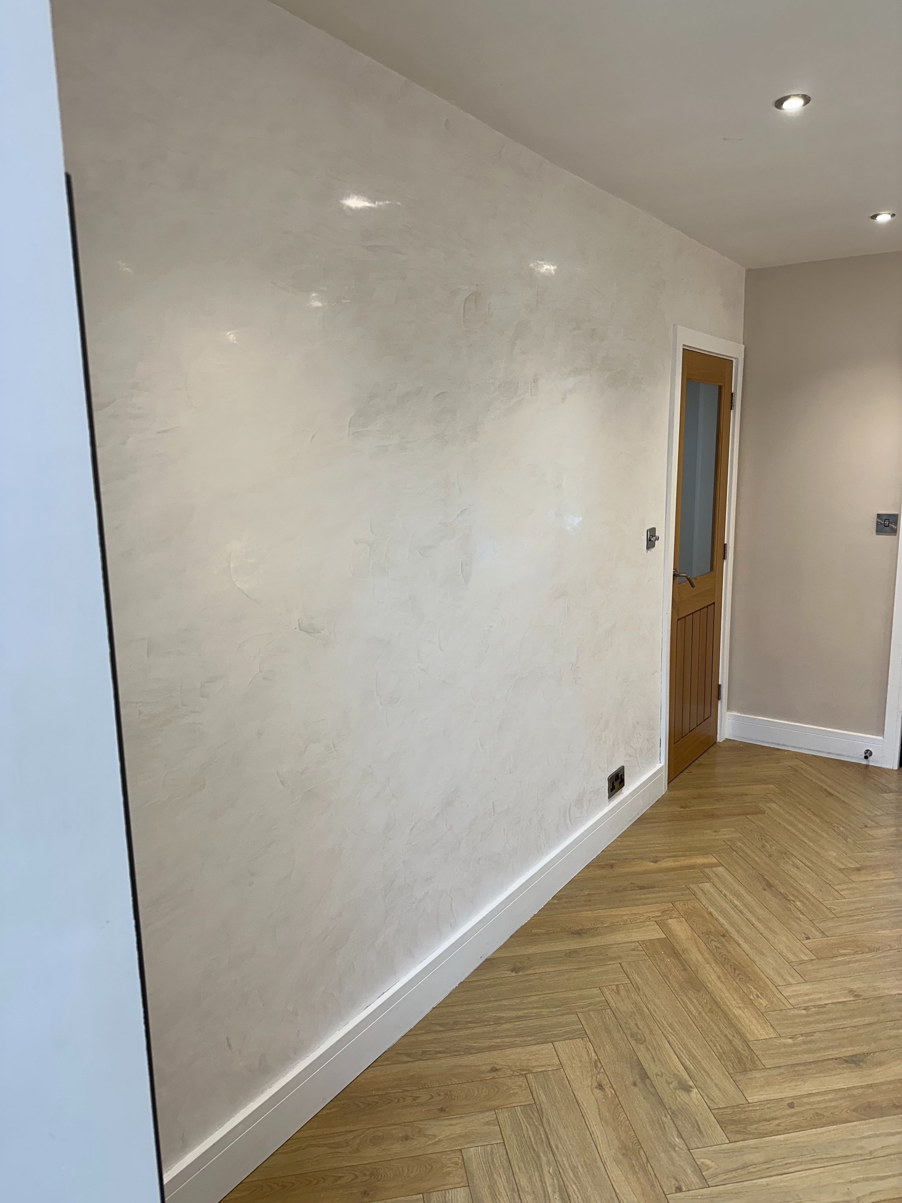 The finished Super Lucido Venetian plaster feature wall, polished to a soft sheen